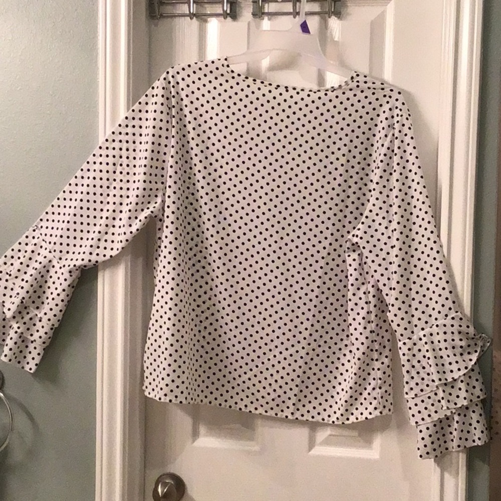 Polka dot blouse with bell sleeves